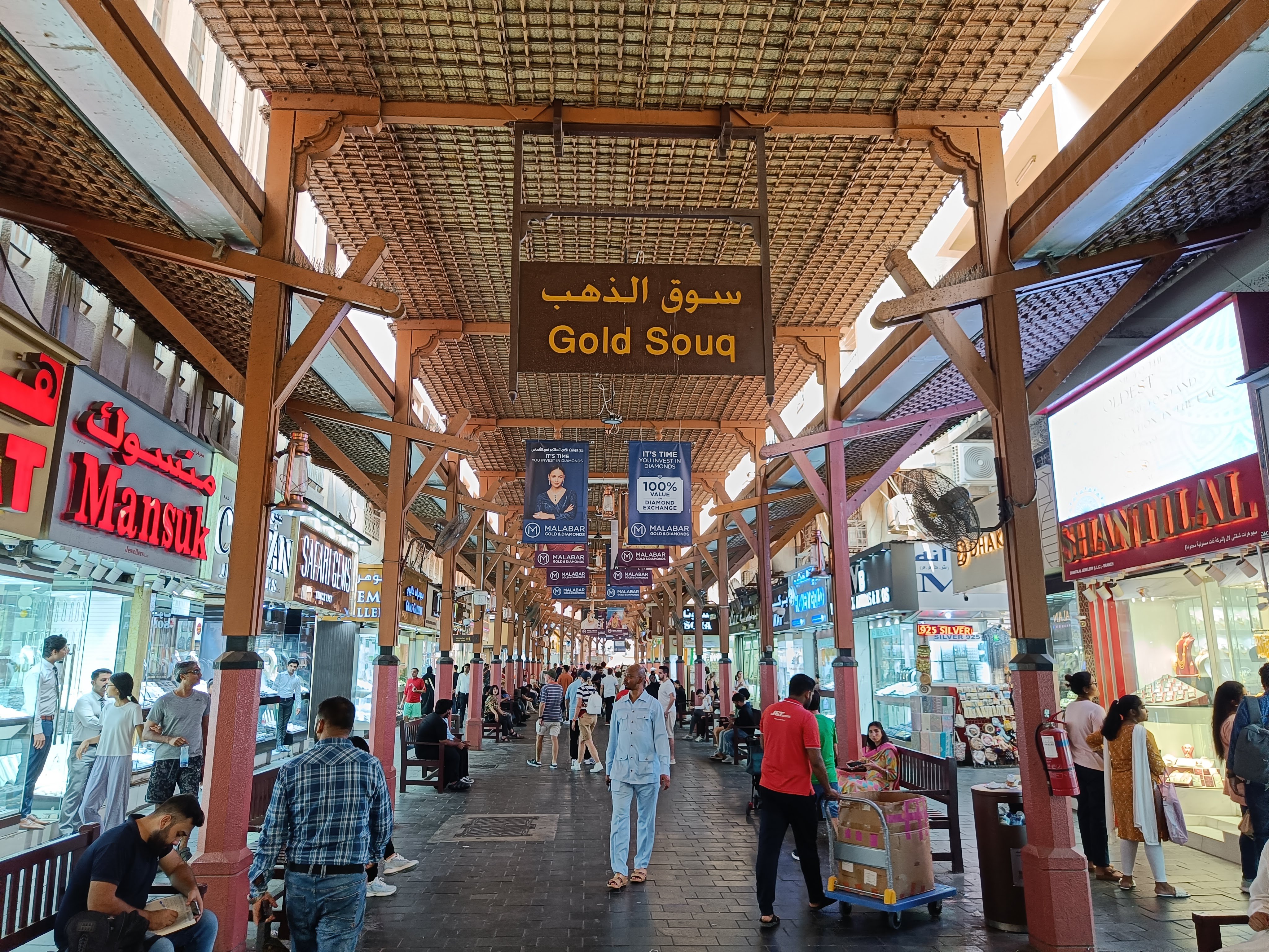 Gold Souk Dubai traditional market - glittering jewelry displays and gold shops in Deira